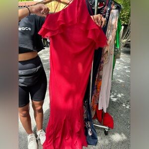 Red mermiad style for al maxi dress form fitting with flare and ruffles